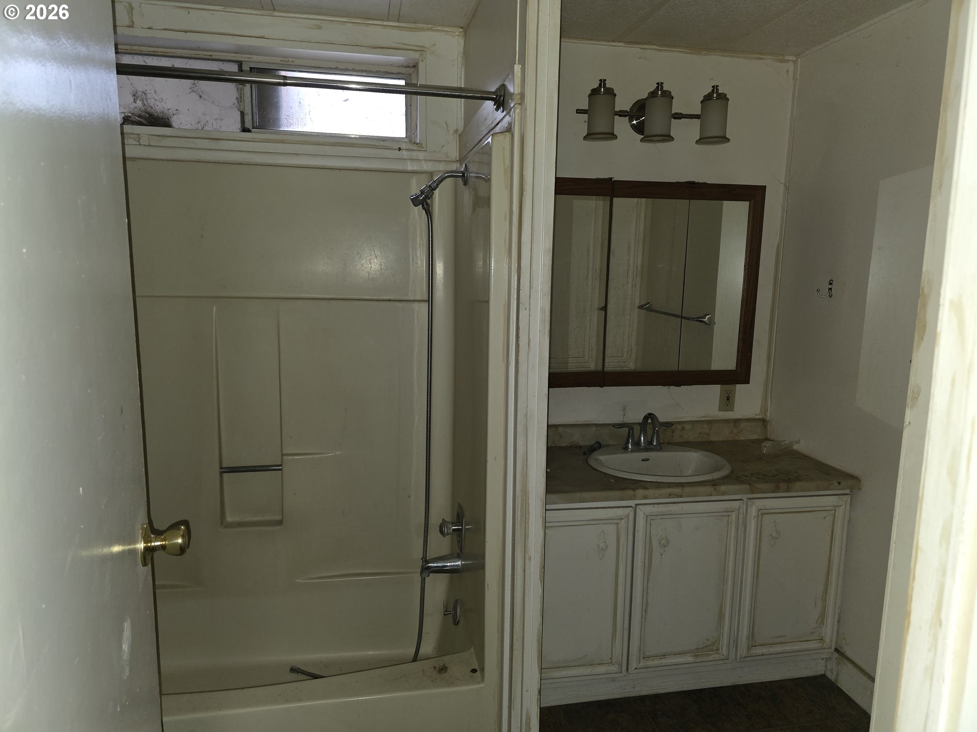 81876 Highway 395 Hermiston, OR 97838 - Photo 4 of 10 a bathroom with a granite countertop sink mirror and vanity