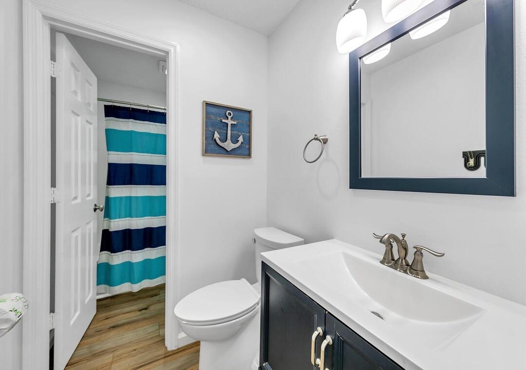 11 Beachside Drive, Unit 832 Santa Rosa Beach, FL 32459 - Photo 15 of 23 a bathroom with a sink and a mirror
