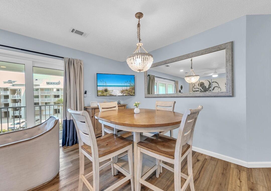 11 Beachside Drive, Unit 832 Santa Rosa Beach, FL 32459 - Photo 4 of 23 a view of a dining room with furniture window and outside view