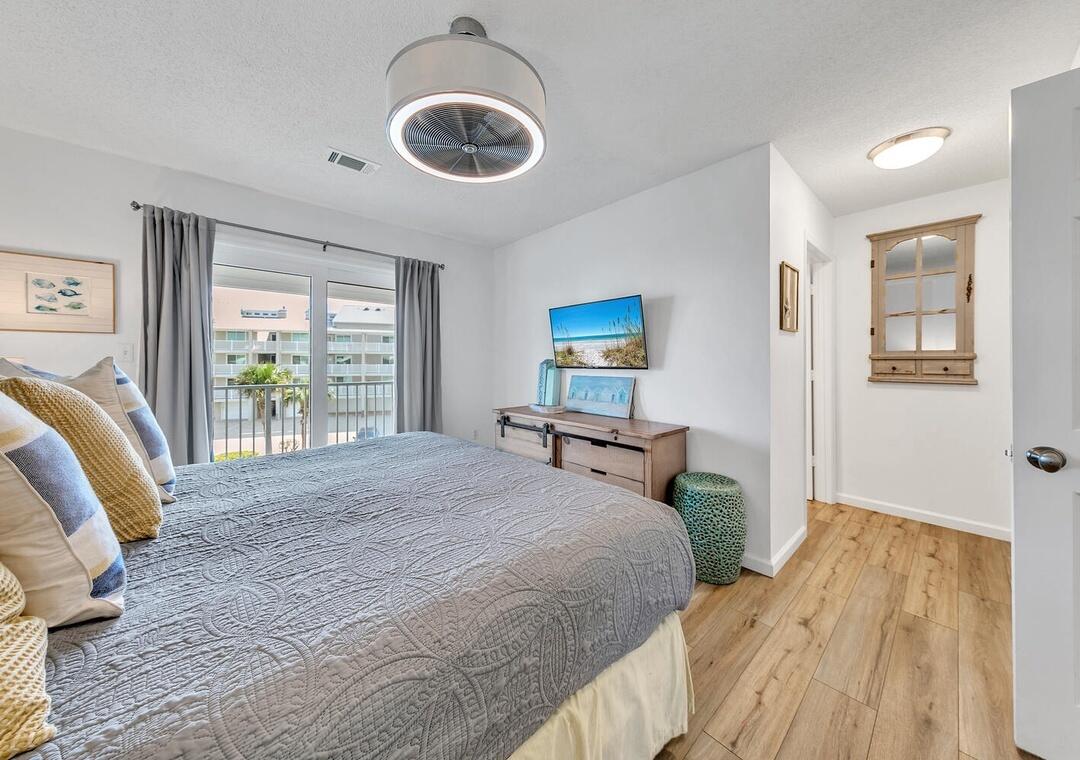 11 Beachside Drive, Unit 832 Santa Rosa Beach, FL 32459 - Photo 6 of 23 a bedroom with a large bed and a large window