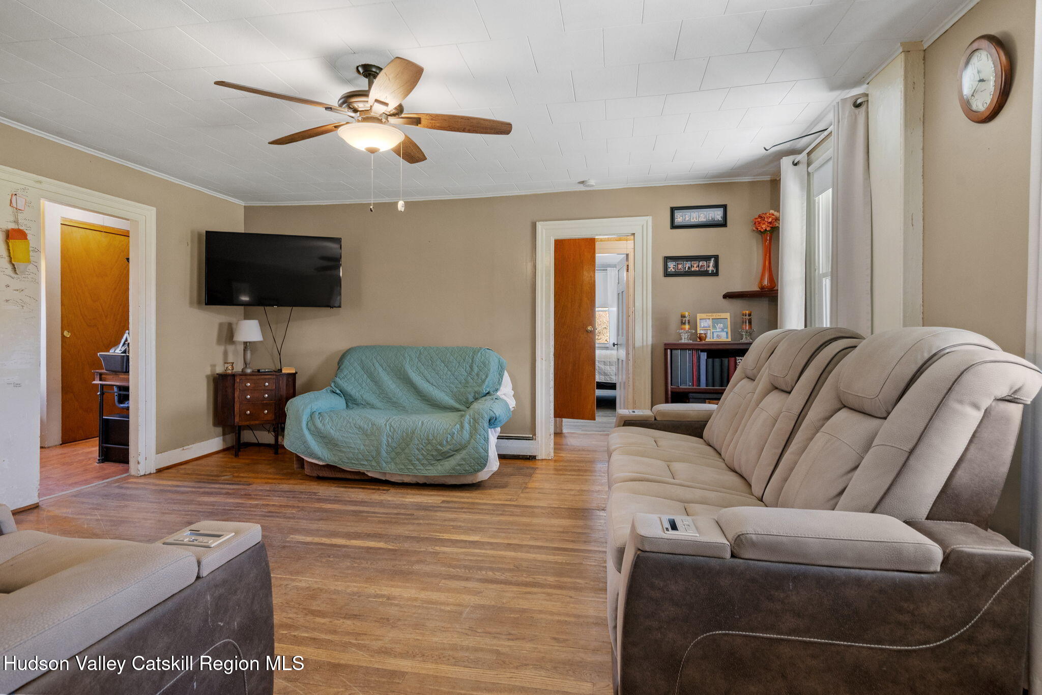 295 County Rte 403 Greenville, NY 12083 - Photo 13 of 65 a living room with furniture and a flat screen tv