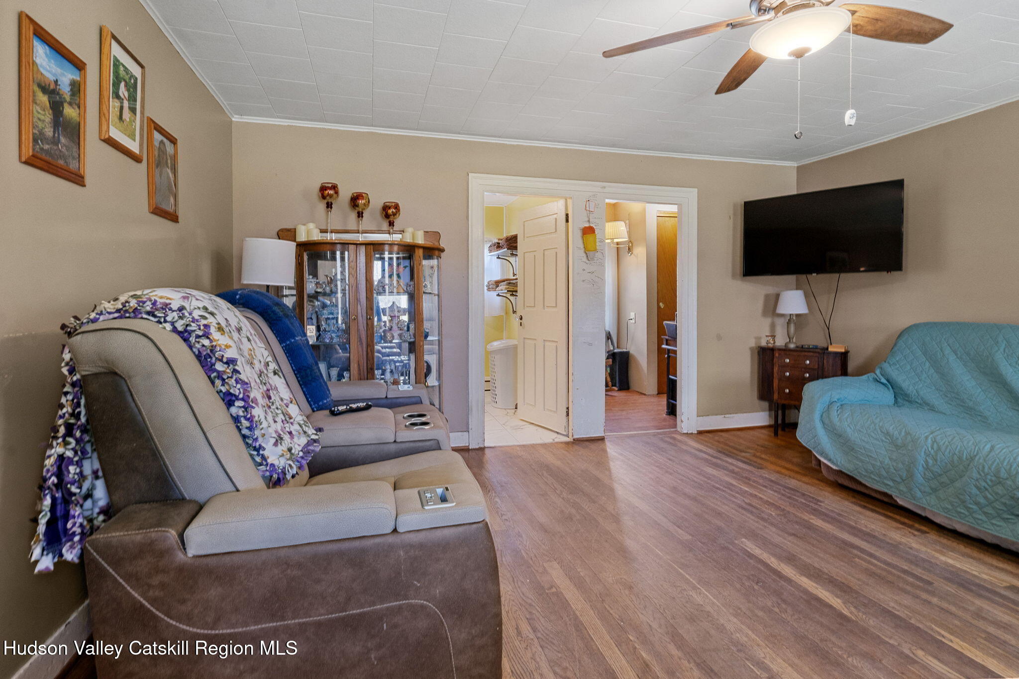 295 County Rte 403 Greenville, NY 12083 - Photo 14 of 65 a living room with furniture and a flat screen tv