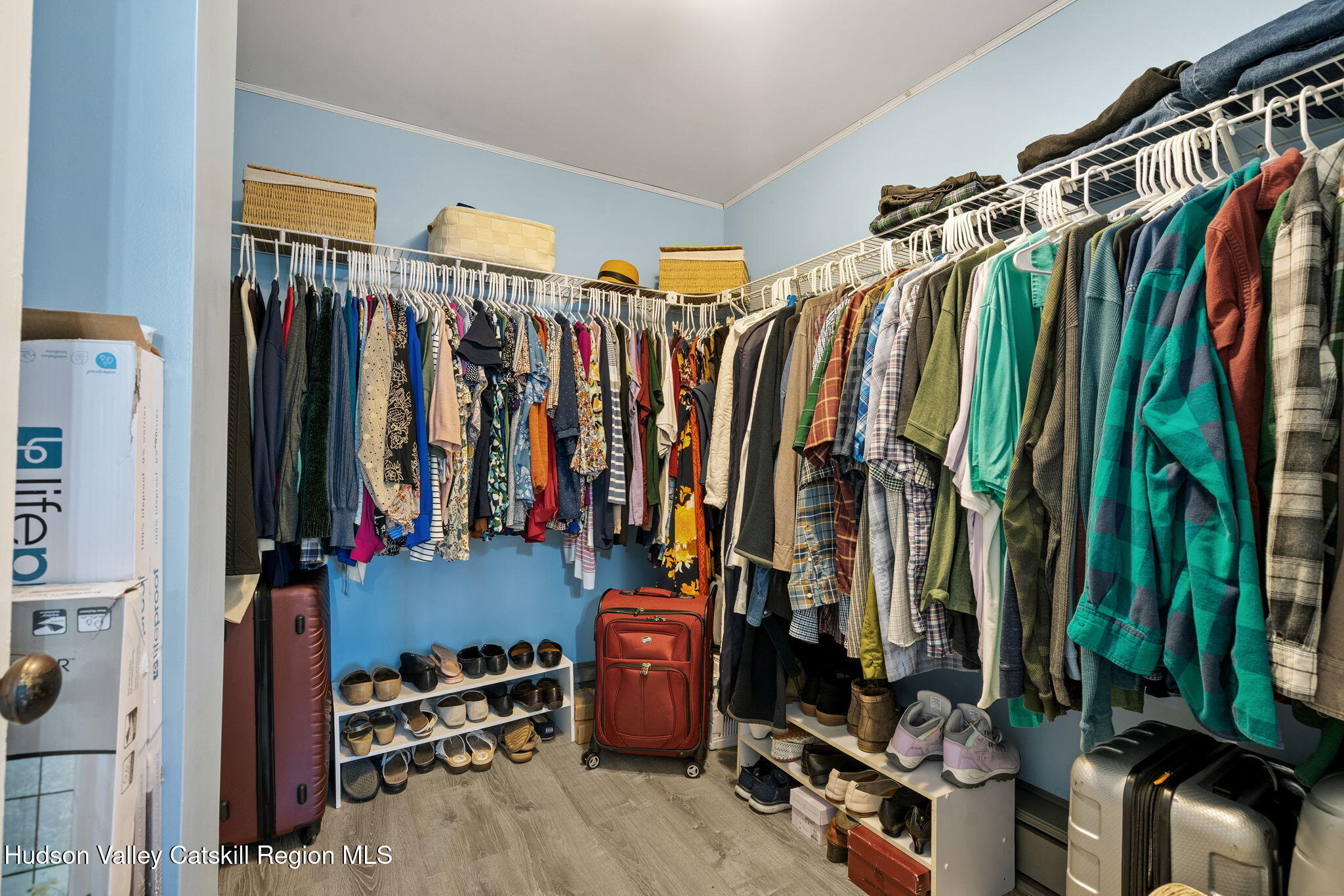 295 County Rte 403 Greenville, NY 12083 - Photo 27 of 65 a view of walk in closet with clothes and shoes