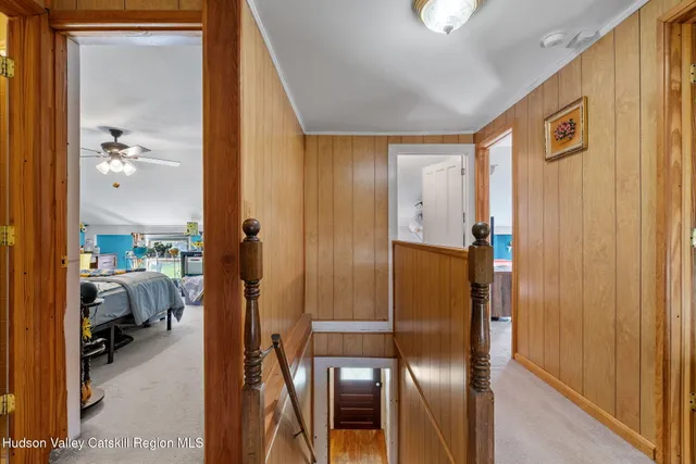 a room with furniture and a flat screen tv