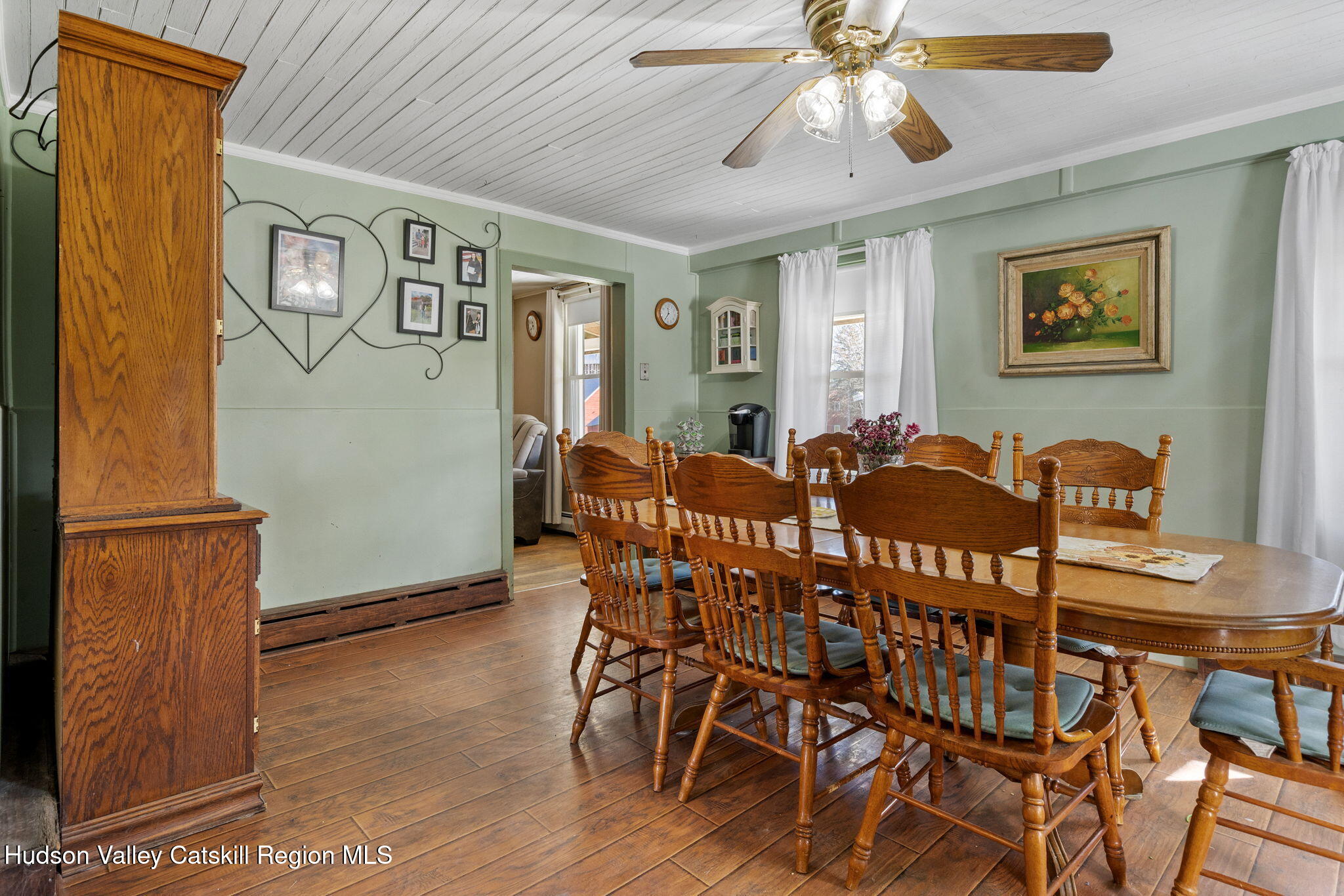 295 County Rte 403 Greenville, NY 12083 - Photo 3 of 65 a view of a dining room with furniture and wooden floor