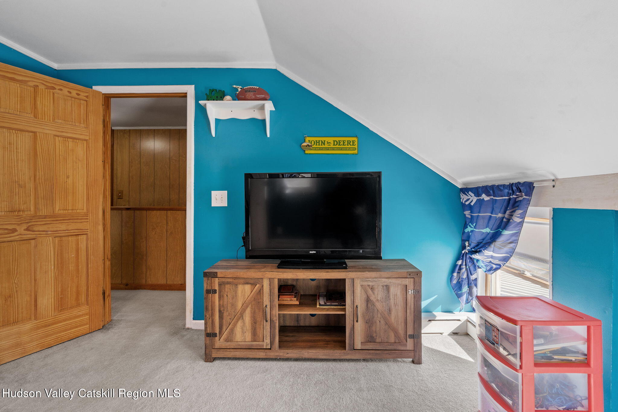 295 County Rte 403 Greenville, NY 12083 - Photo 40 of 65 a room with furniture and a flat screen tv