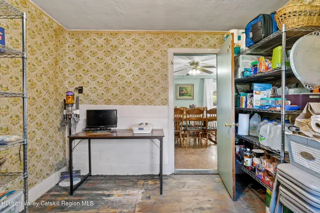 a kitchen with white cabinets and a white wooden cabinets