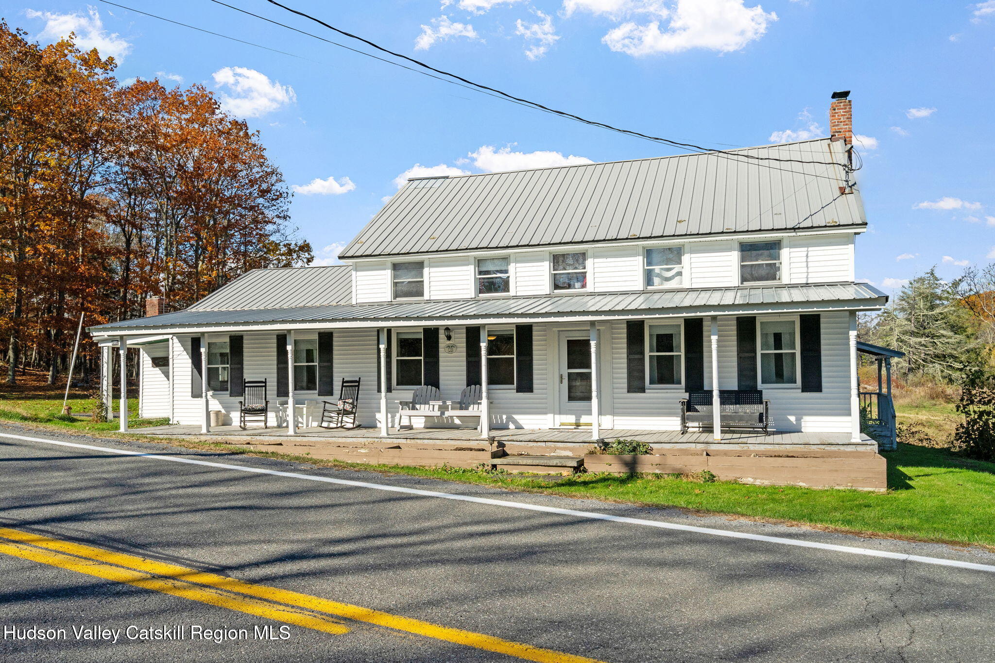 295 County Rte 403 Greenville, NY 12083 - Photo 53 of 65 a front view of a house with swimming pool and chairs