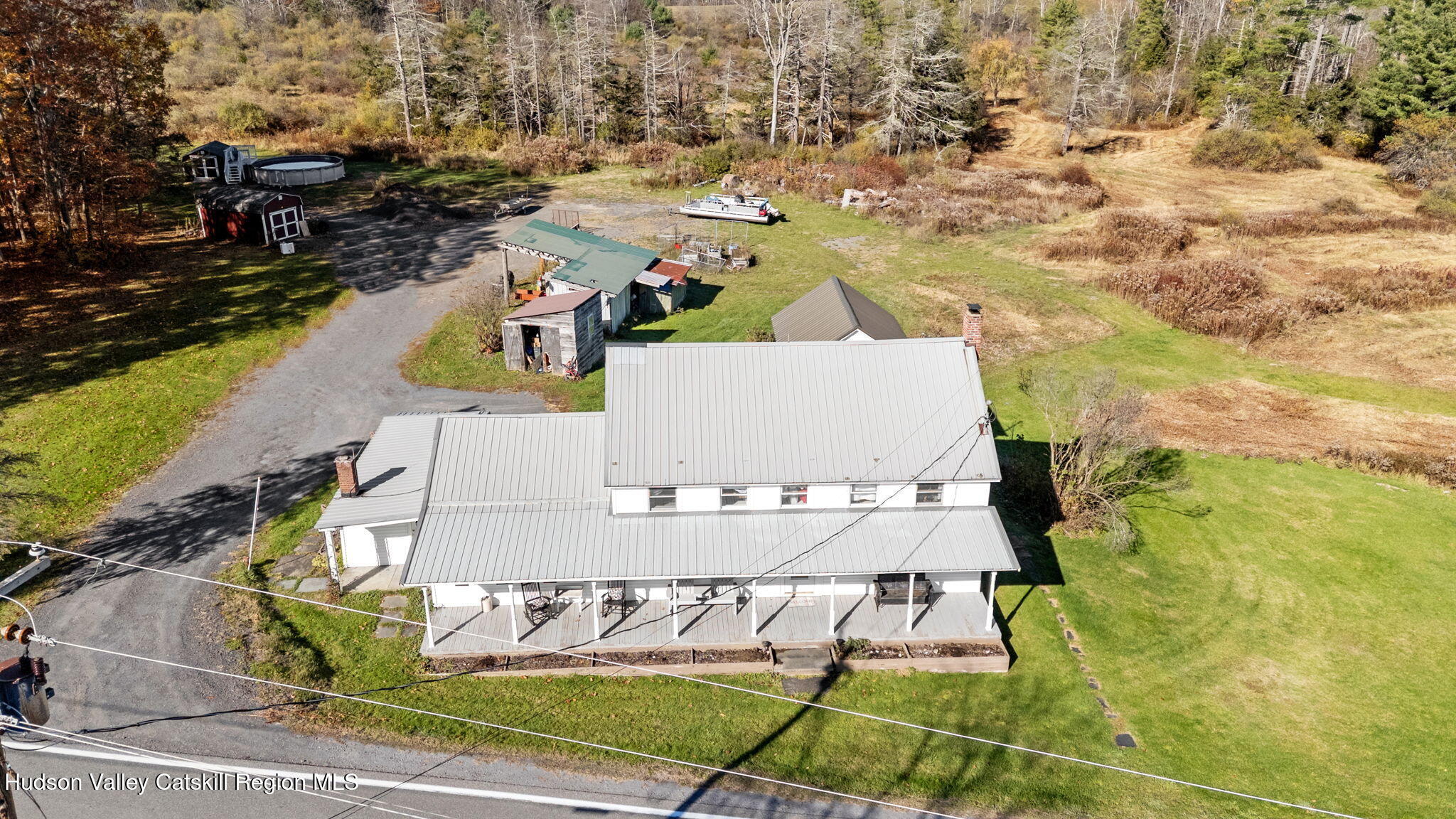 295 County Rte 403 Greenville, NY 12083 - Photo 65 of 65 an aerial view of a house with swimming pool and ocean view
