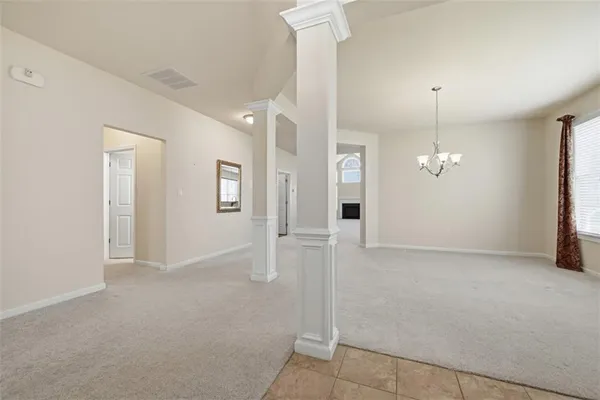 a view of a livingroom with a staircase