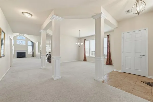 a view of livingroom with hardwood floor and a ceiling fan