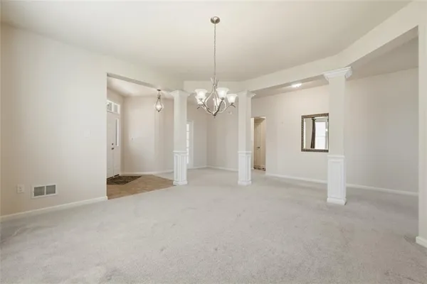 a open kitchen with cabinets a sink and stainless steel appliances
