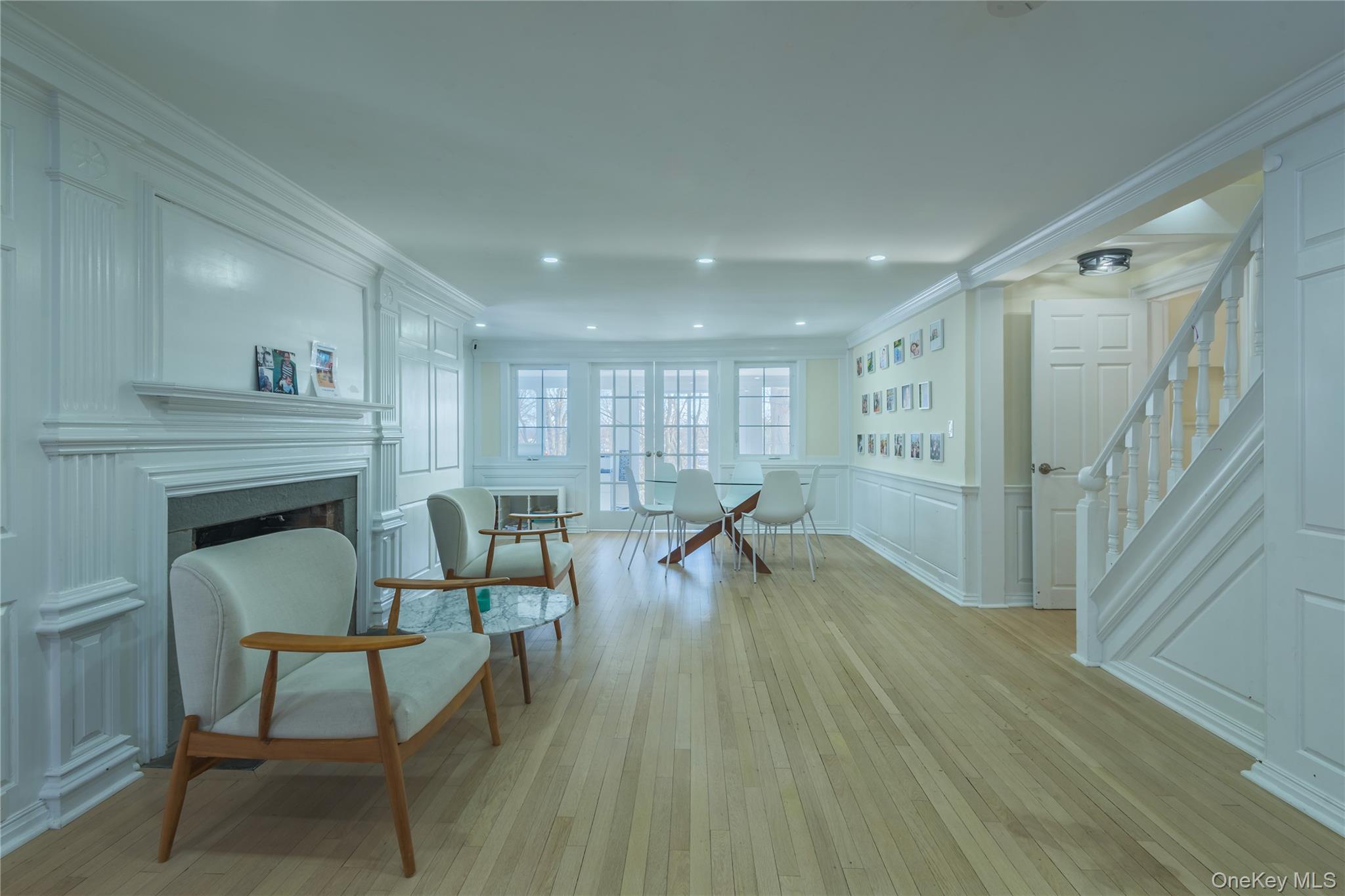 20 North Ravine Road Great Neck, NY 11023 - Photo 2 of 27 a living room with furniture and a wooden floor