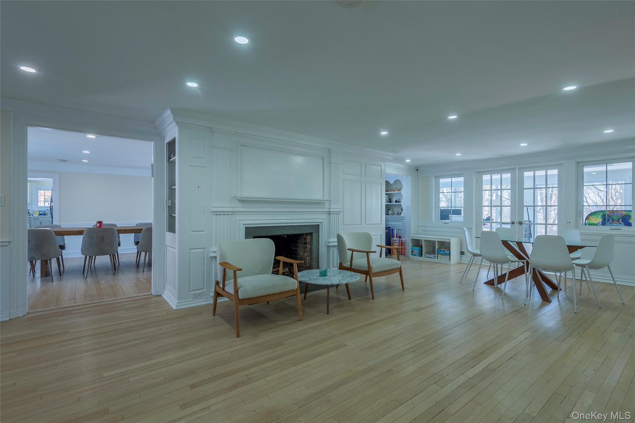 20 North Ravine Road Great Neck, NY 11023 - Photo 5 of 27 a living room with furniture and a fireplace