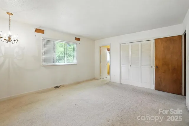 an empty room with windows