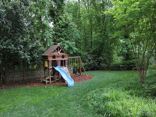 1916 Ridge Road Raleigh, NC 27607 - Photo 24 of 25 a wooden house with a park