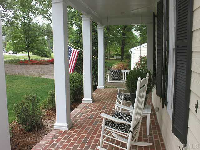 1916 Ridge Road Raleigh, NC 27607 - Photo 3 of 25 a view of balcony with furniture and garden