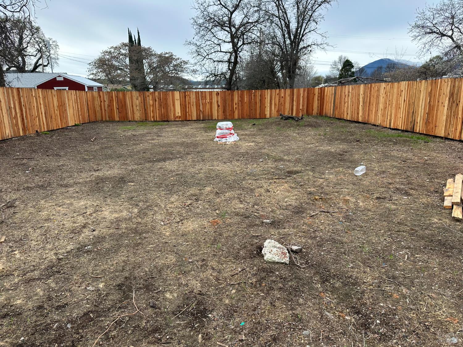 13125 4th Street Clearlake Oaks, CA 95423 - Photo 1 of 2 a view of outdoor space with wooden fence