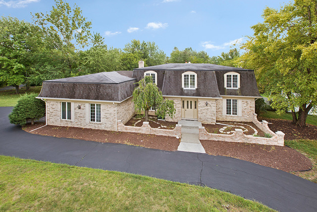 front view of house with a yard