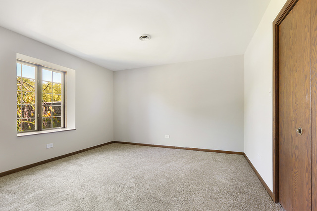 3033 East Hickory Lane Crete, IL 60417 - Photo 13 of 18 an empty room with a window