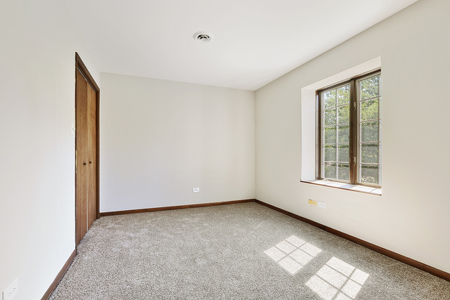 3033 East Hickory Lane Crete, IL 60417 - Photo 14 of 18 an empty room with a window