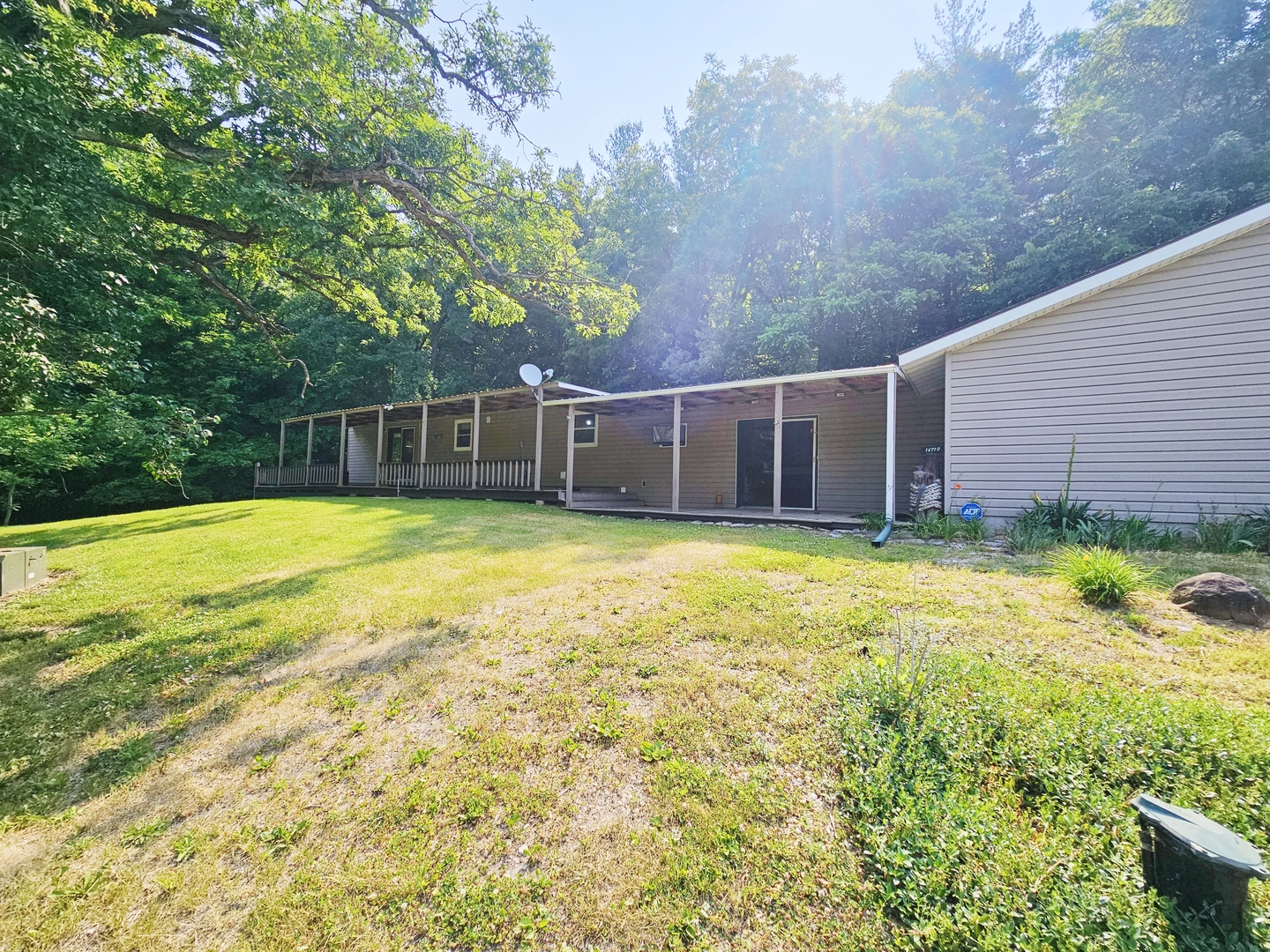 16710 Browns Road Morrison, IL 61270 - Photo 1 of 39 a view of a house with a swimming pool
