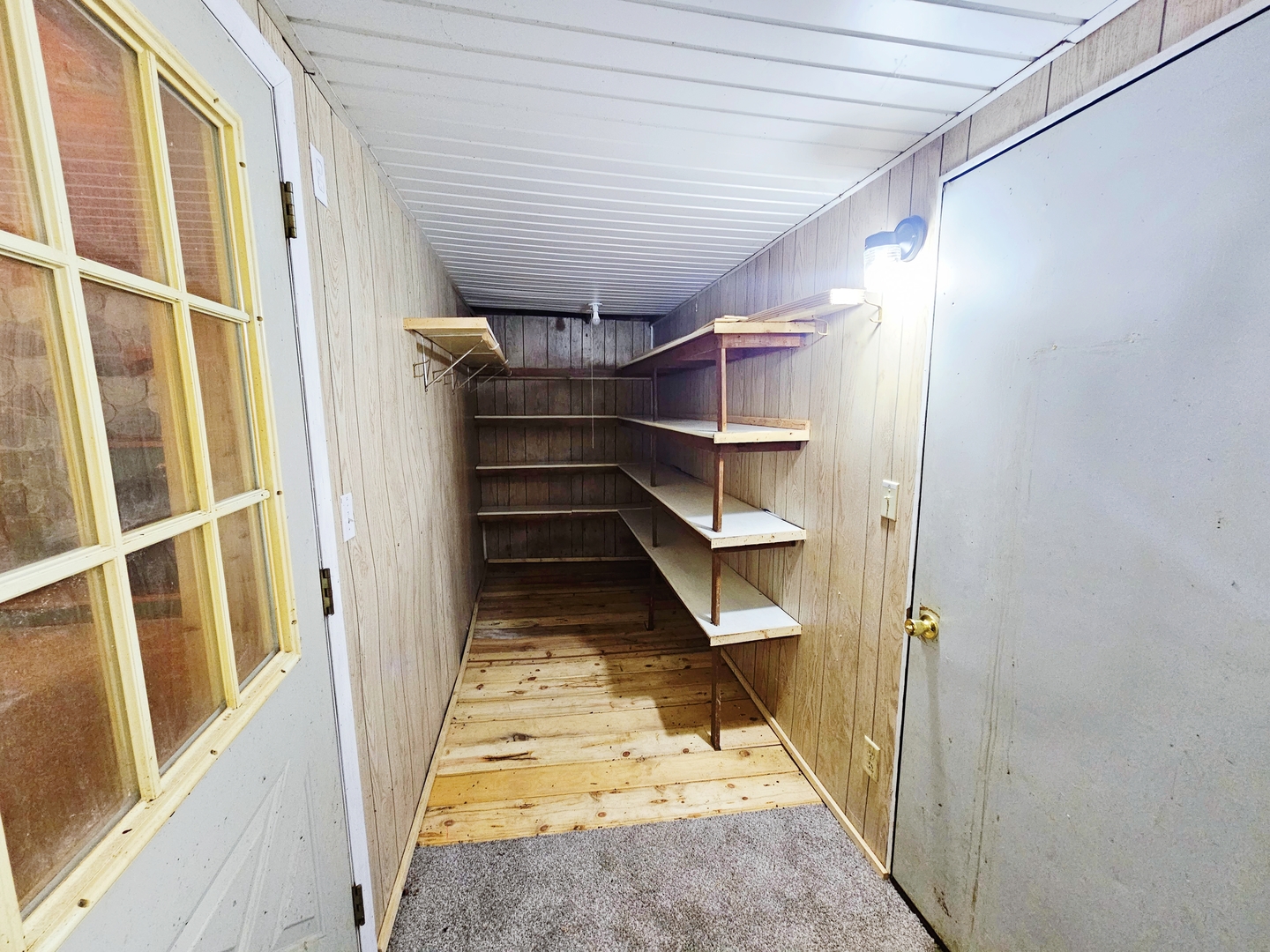 16710 Browns Road Morrison, IL 61270 - Photo 29 of 39 a view of walk in closet with empty racks