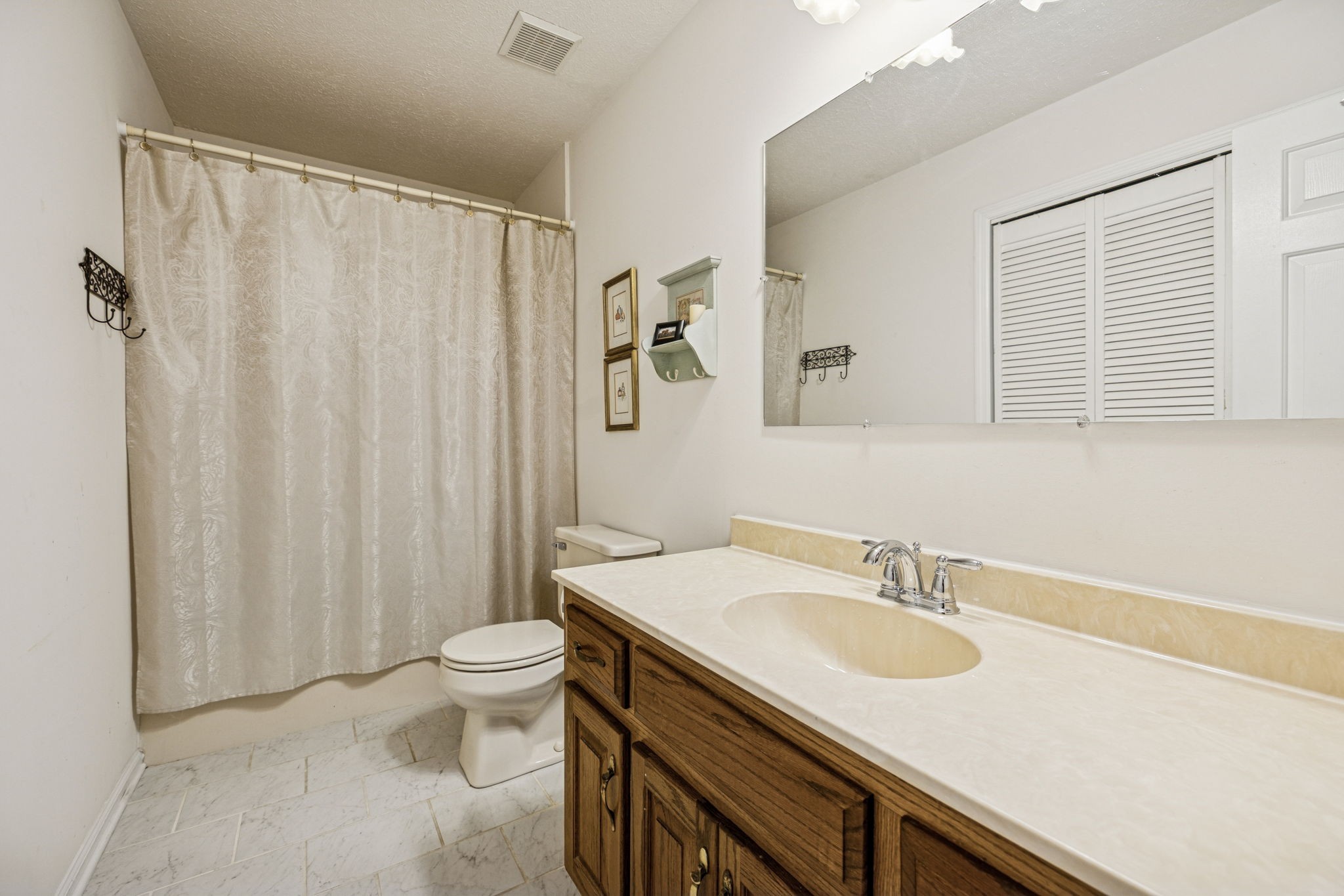 3328 Beckwith Road Mount Juliet, TN 37122 - Photo 11 of 18 a bathroom with a sink and a mirror