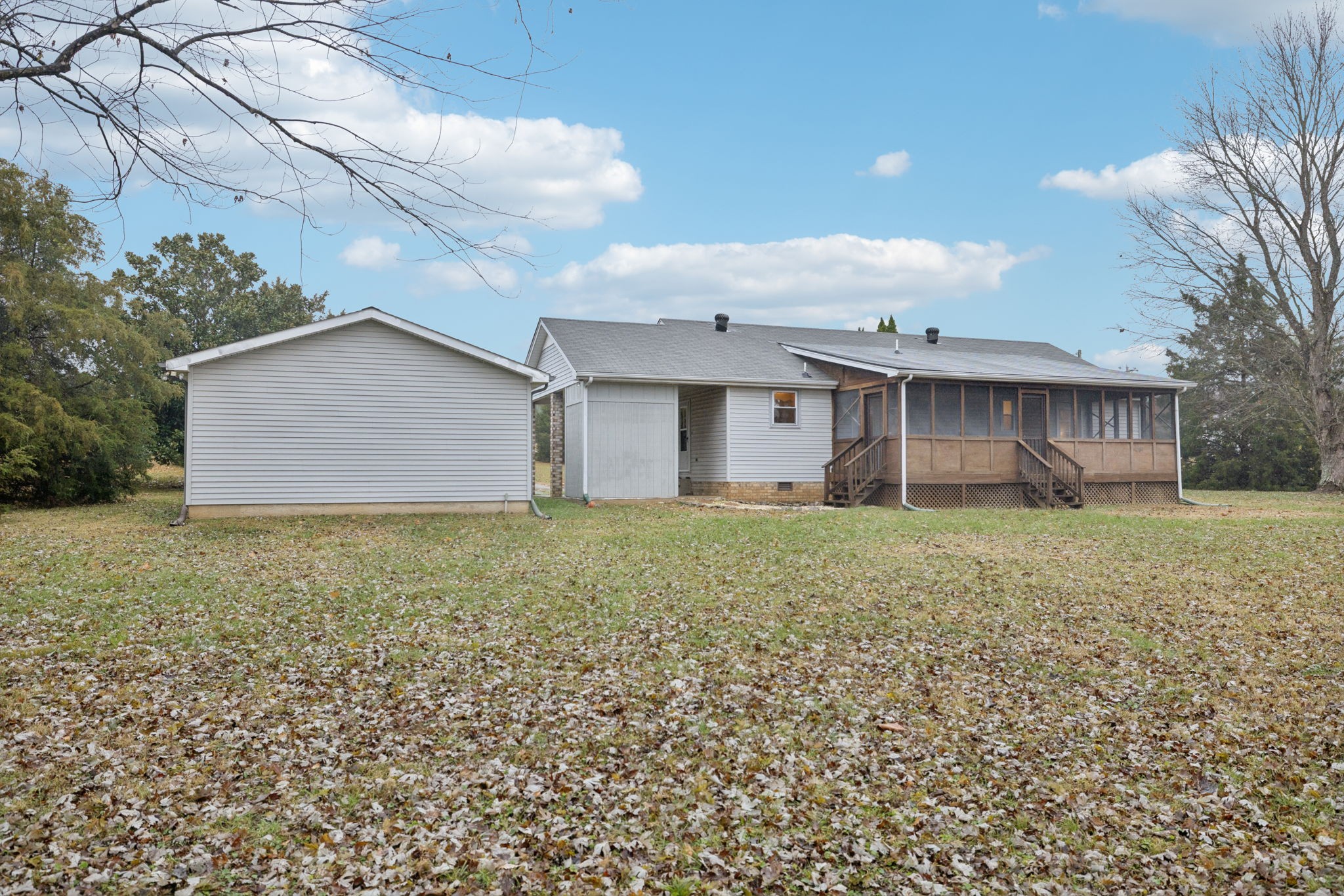 3328 Beckwith Road Mount Juliet, TN 37122 - Photo 17 of 18 a front view of house with yard and trees around