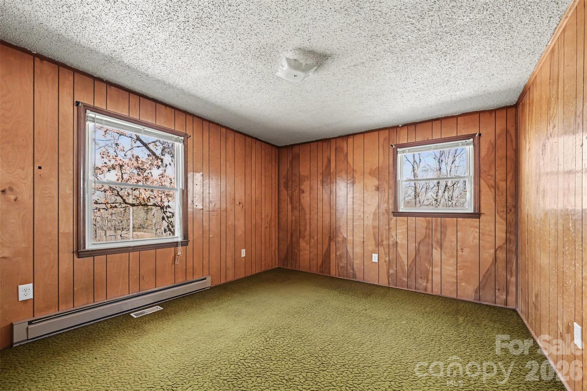 4650 Windy Road Concord, NC 28027 - Photo 12 of 34 an empty room with windows
