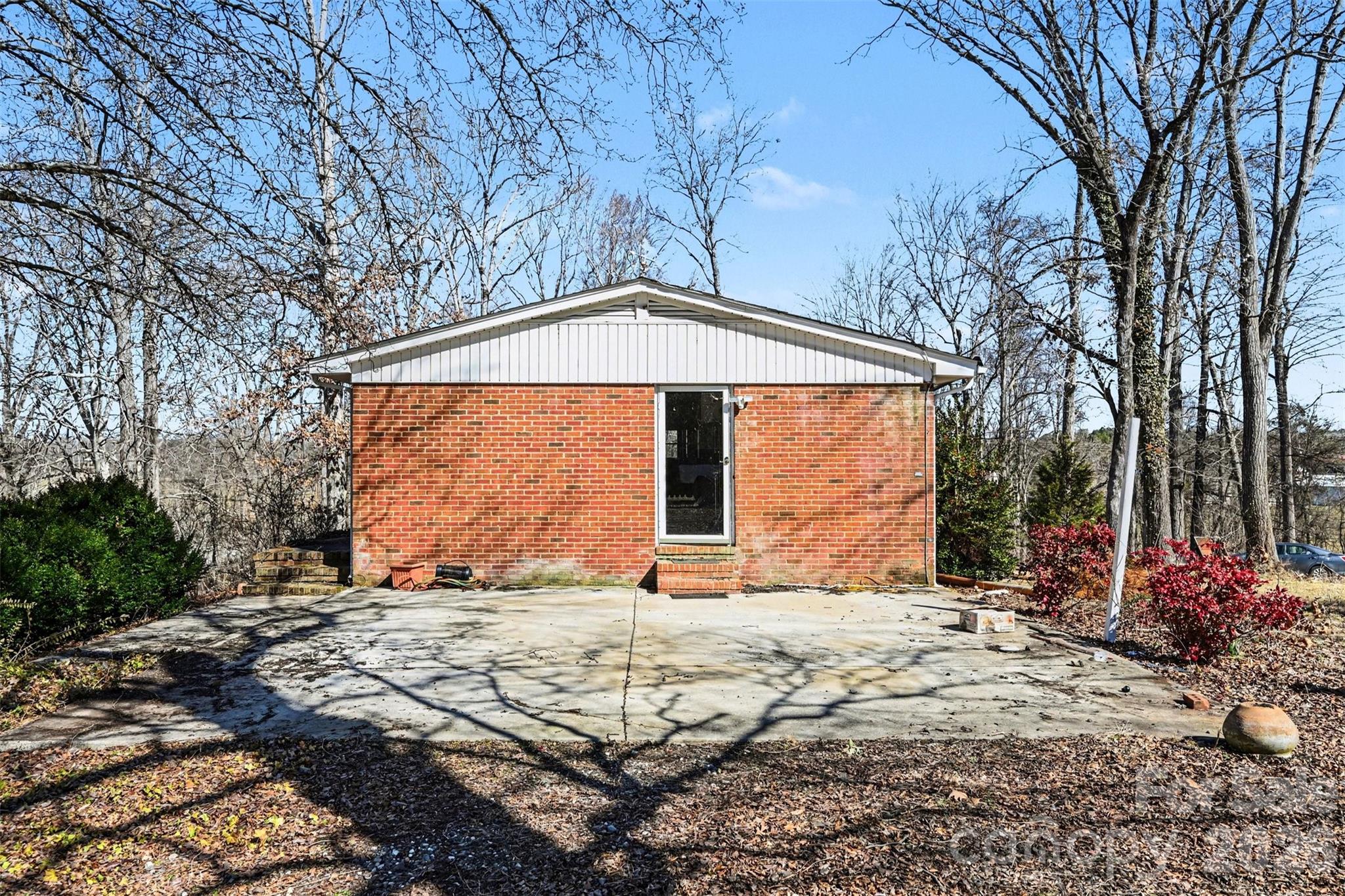 4650 Windy Road Concord, NC 28027 - Photo 15 of 34 a view of a house with snow on the ground