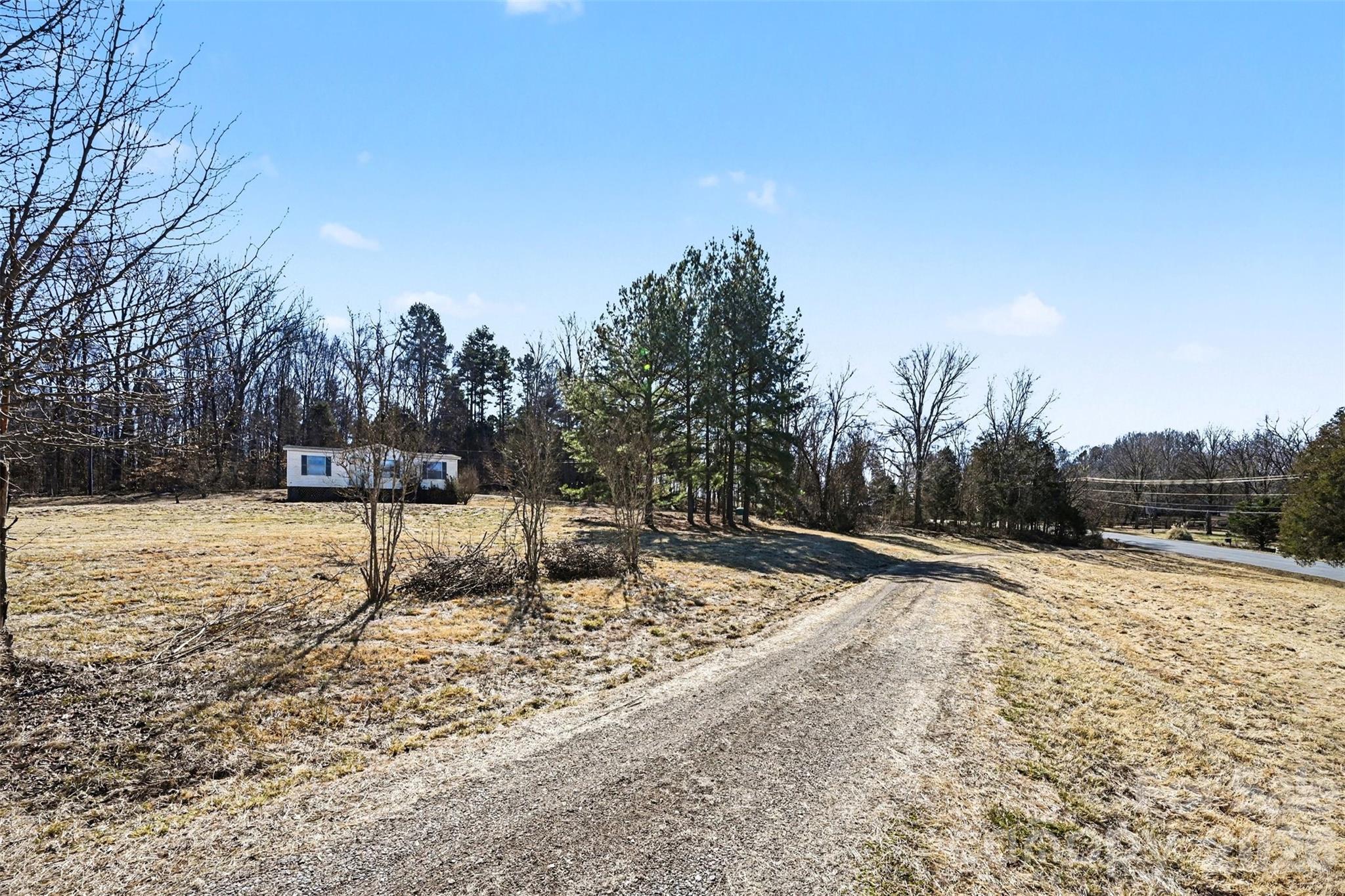 4650 Windy Road Concord, NC 28027 - Photo 22 of 34 a view of outdoor space with trees