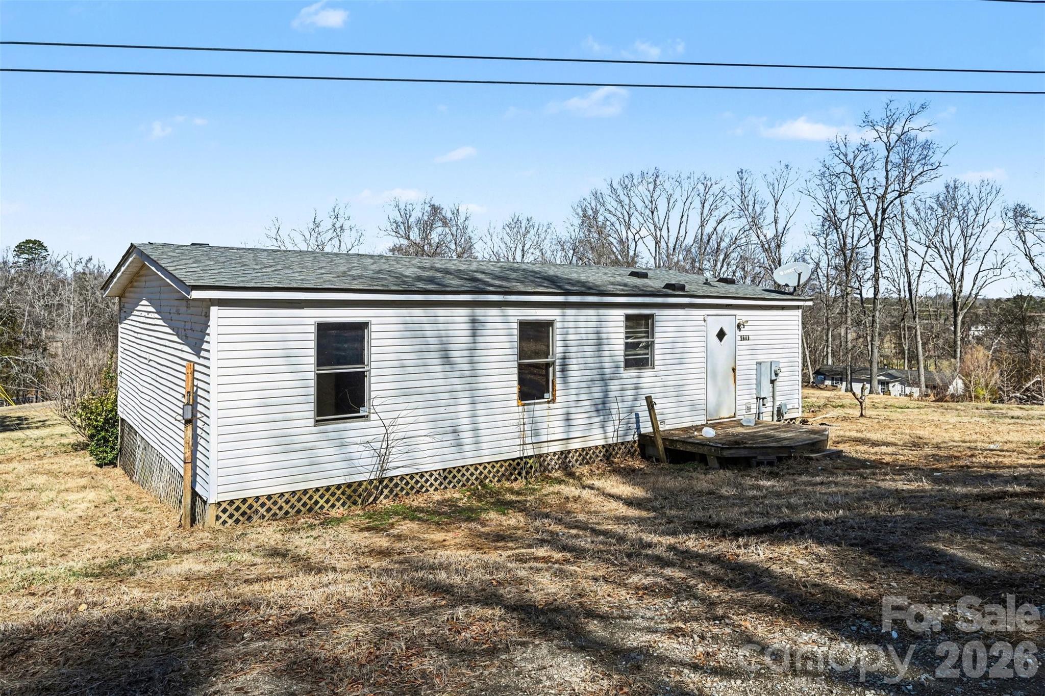4650 Windy Road Concord, NC 28027 - Photo 25 of 34 a backyard of a house
