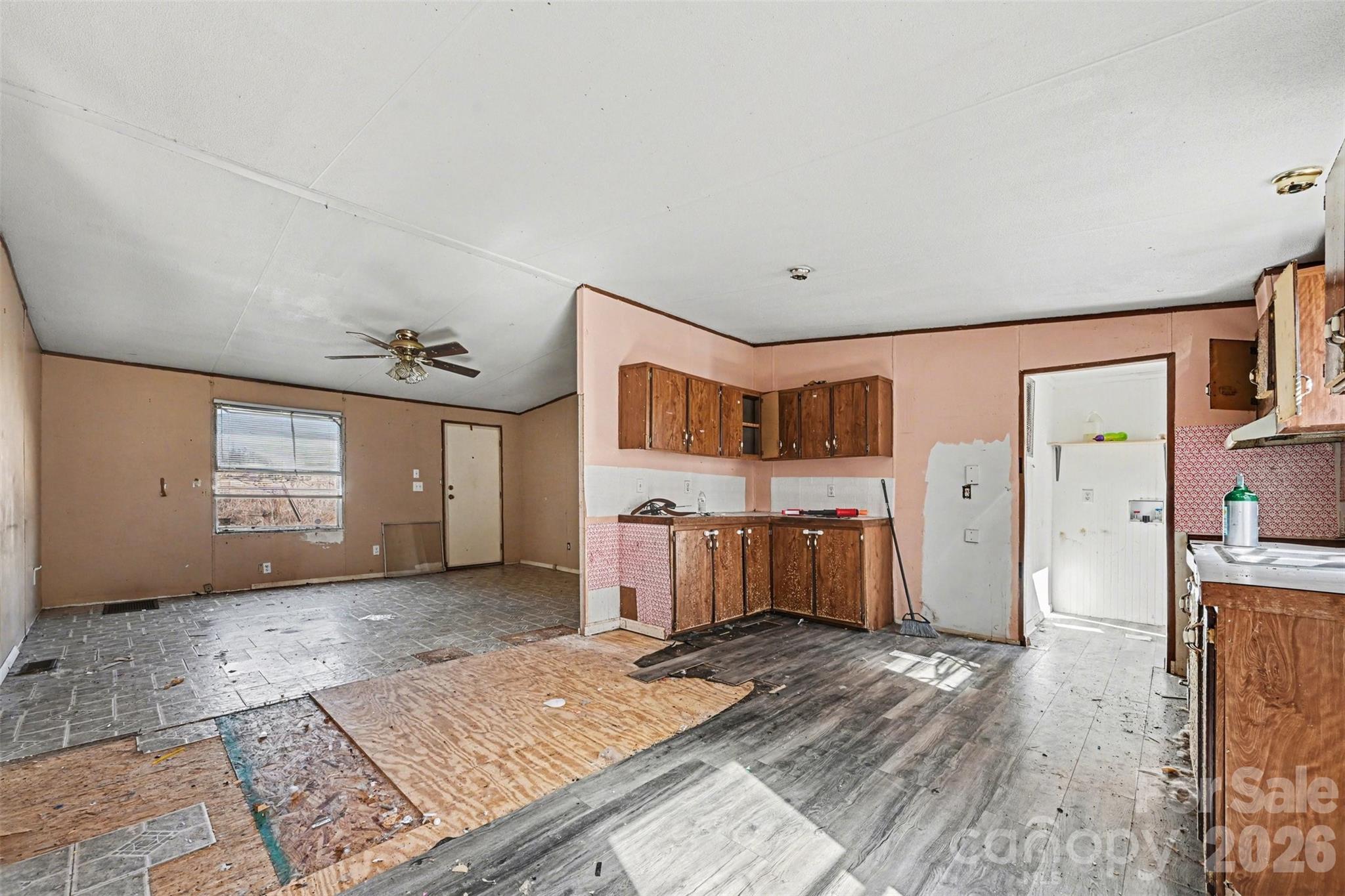 4650 Windy Road Concord, NC 28027 - Photo 26 of 34 a view of a bedroom with wooden floor and window