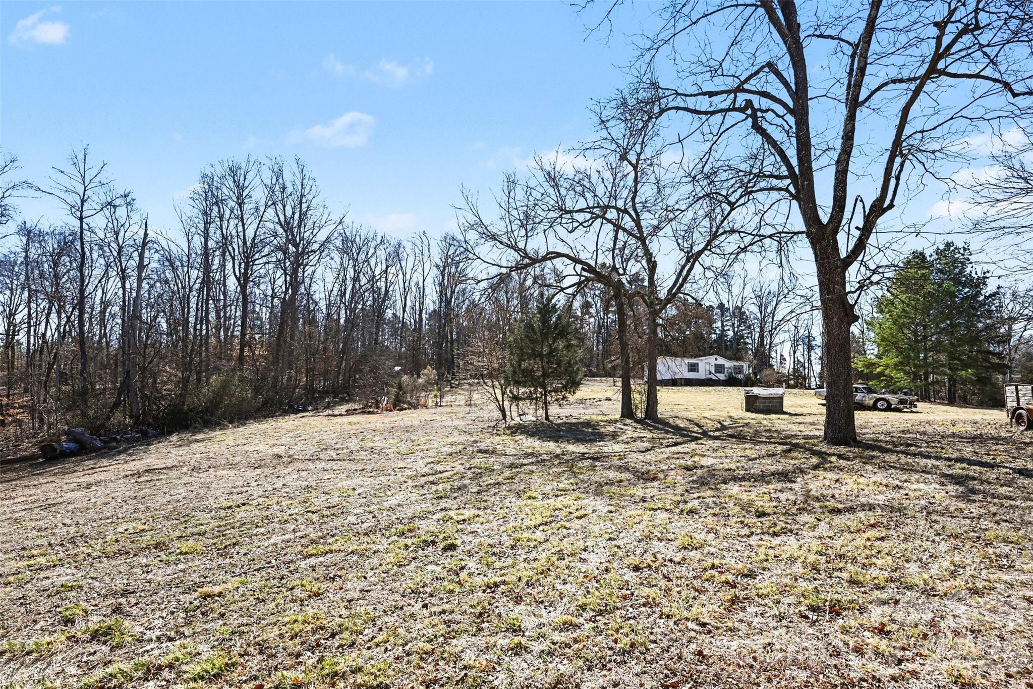 4650 Windy Road Concord, NC 28027 - Photo 28 of 34 a view of a yard with trees