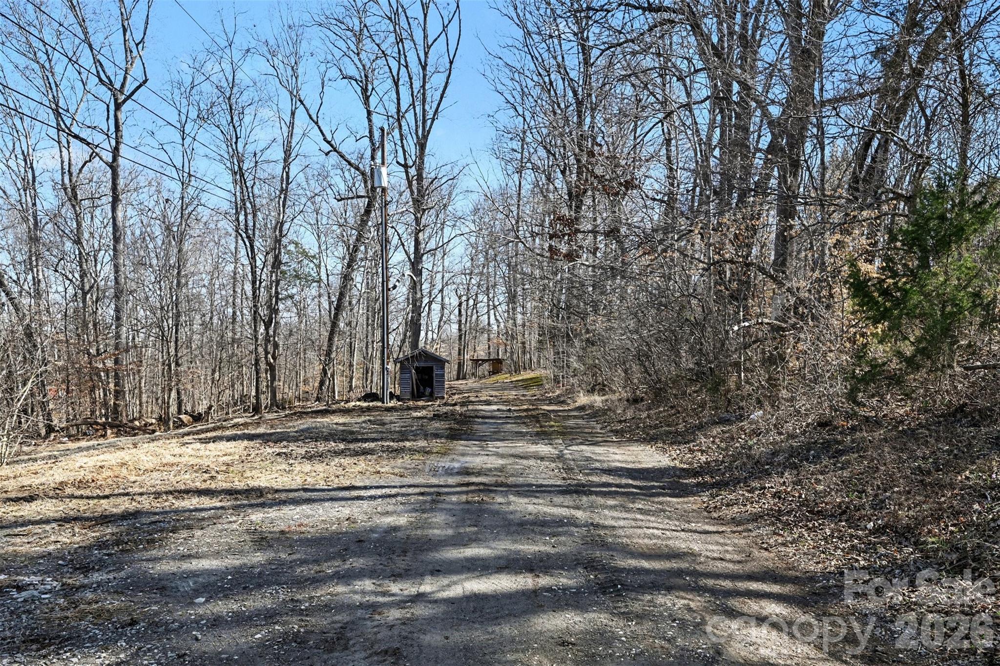 4650 Windy Road Concord, NC 28027 - Photo 29 of 34 a view of a backyard of the house