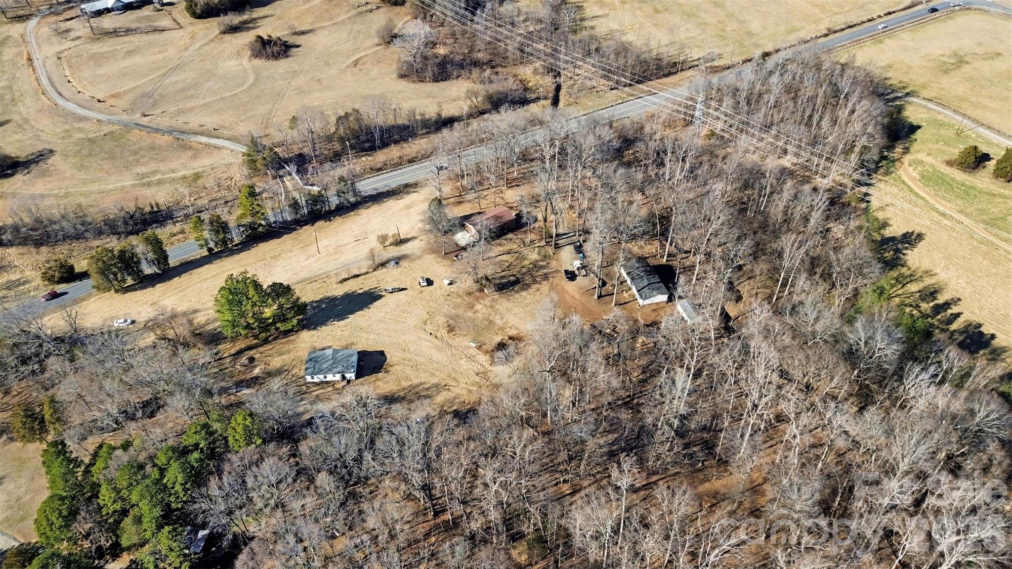 4650 Windy Road Concord, NC 28027 - Photo 33 of 34 a view of a yard with wooden fence