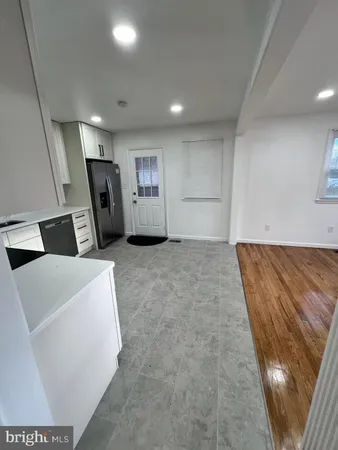 a view of livingroom with furniture and window