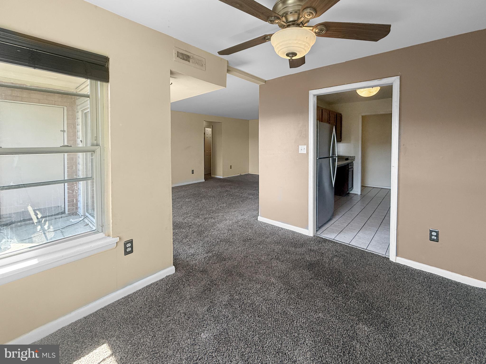 3807 St Barnabas Road, Unit 203 Suitland, MD 20746 - Photo 8 of 23 Spacious, sunlit living area awaits!