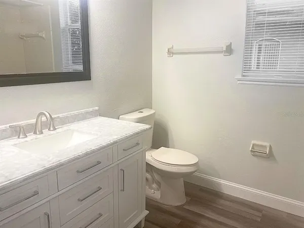 a bathroom with a sink and a toilet