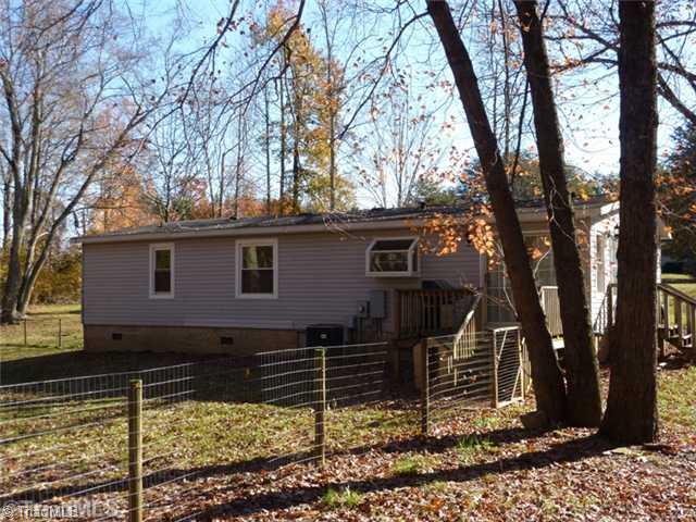 8136 Shoeline Road Stokesdale, NC 27357 - Photo 13 of 16 Exterior Back.
