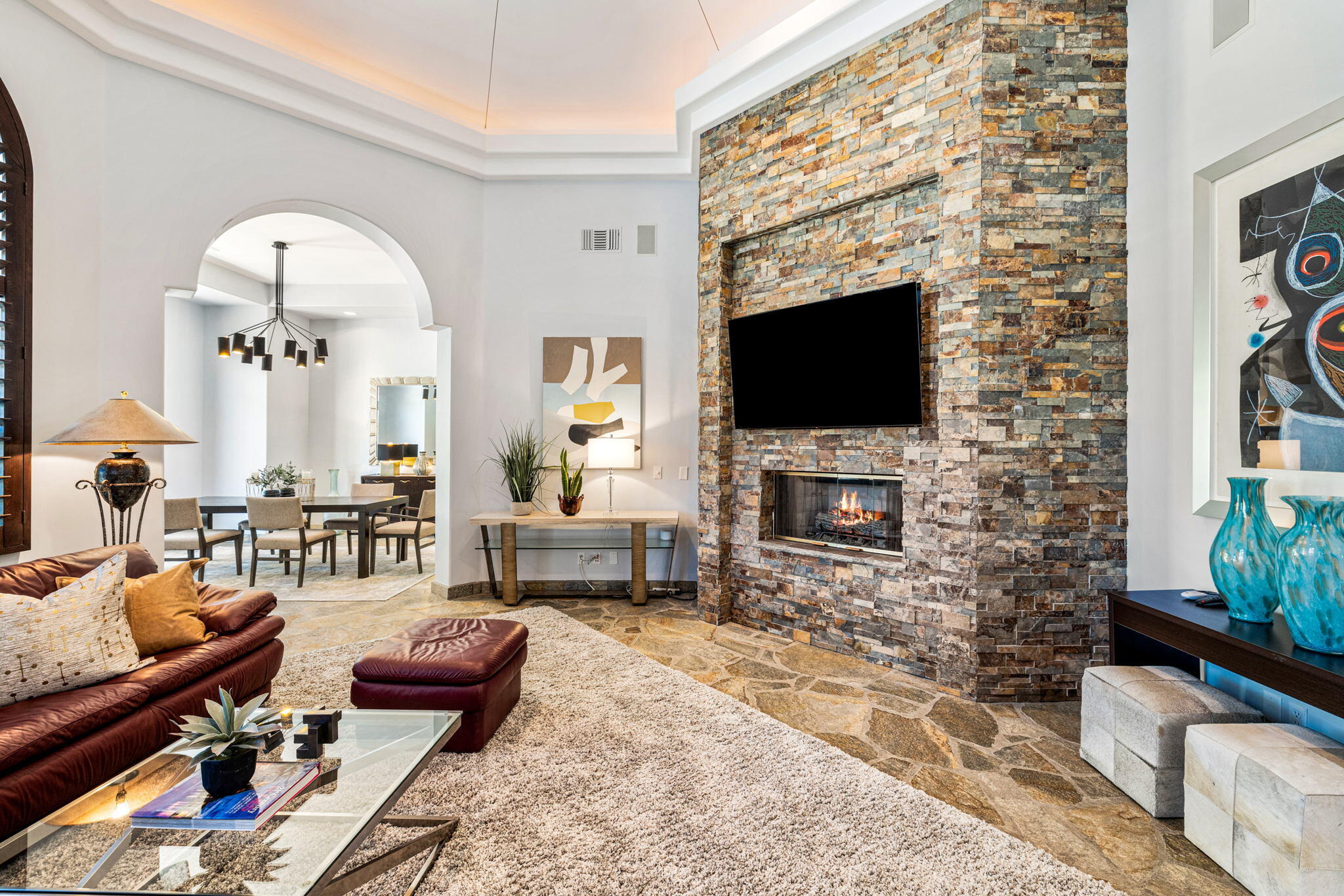 28 Clancy Lane South Rancho Mirage, CA 92270 - Photo 29 of 78 a living room with furniture a flat screen tv and a fireplace