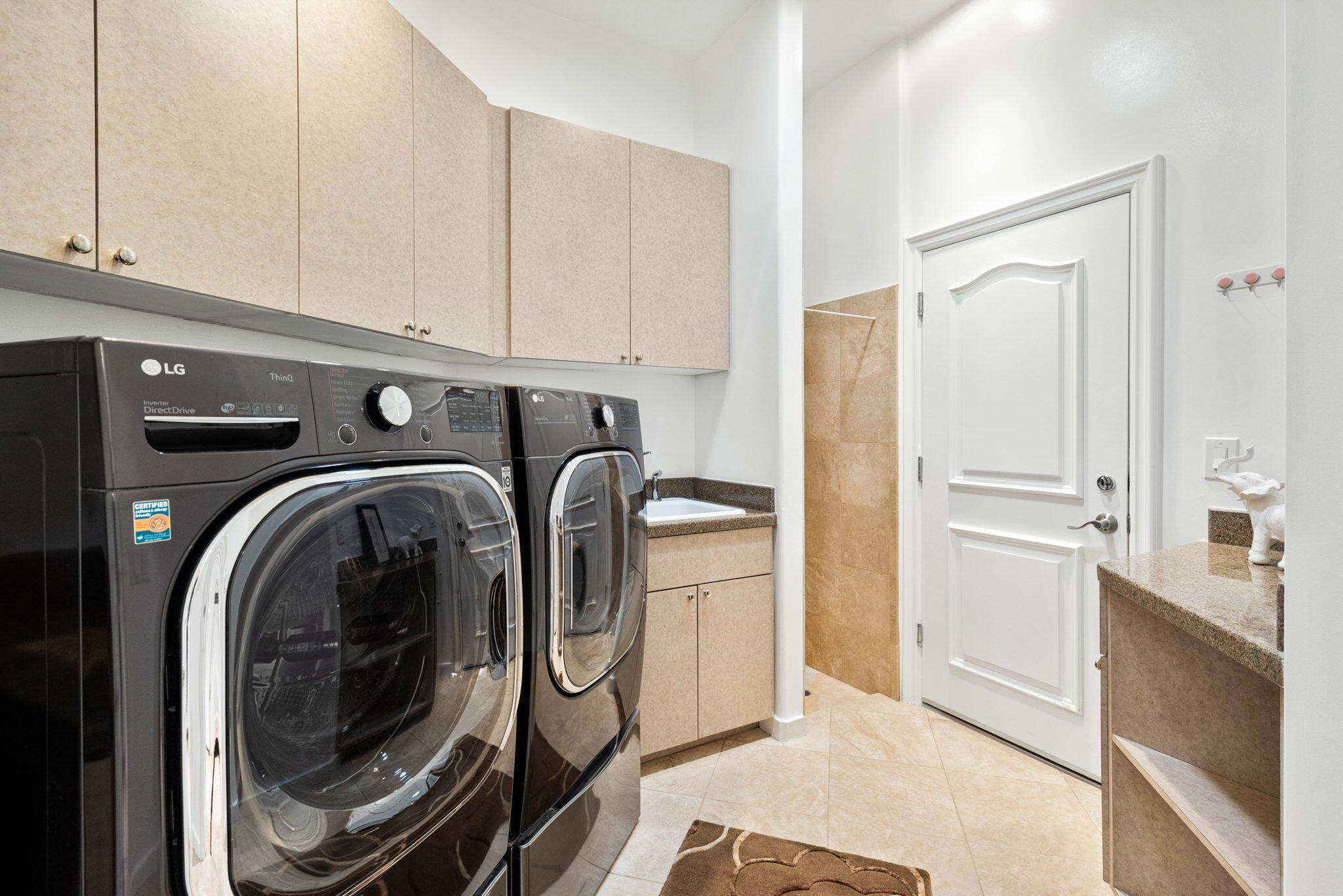 28 Clancy Lane South Rancho Mirage, CA 92270 - Photo 55 of 78 a utility room with closet dryer and washer