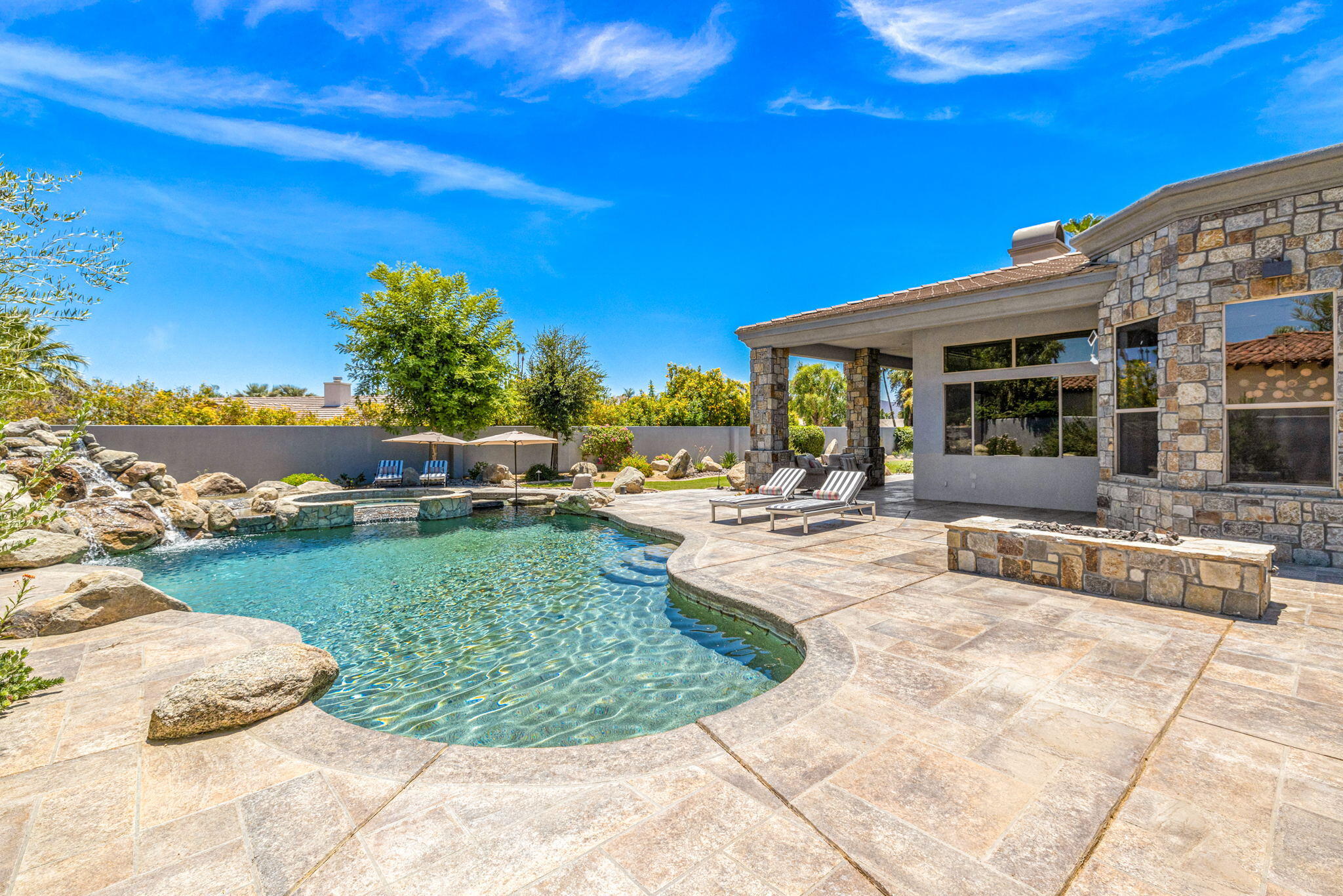28 Clancy Lane South Rancho Mirage, CA 92270 - Photo 66 of 78 a view of a swimming pool with a patio