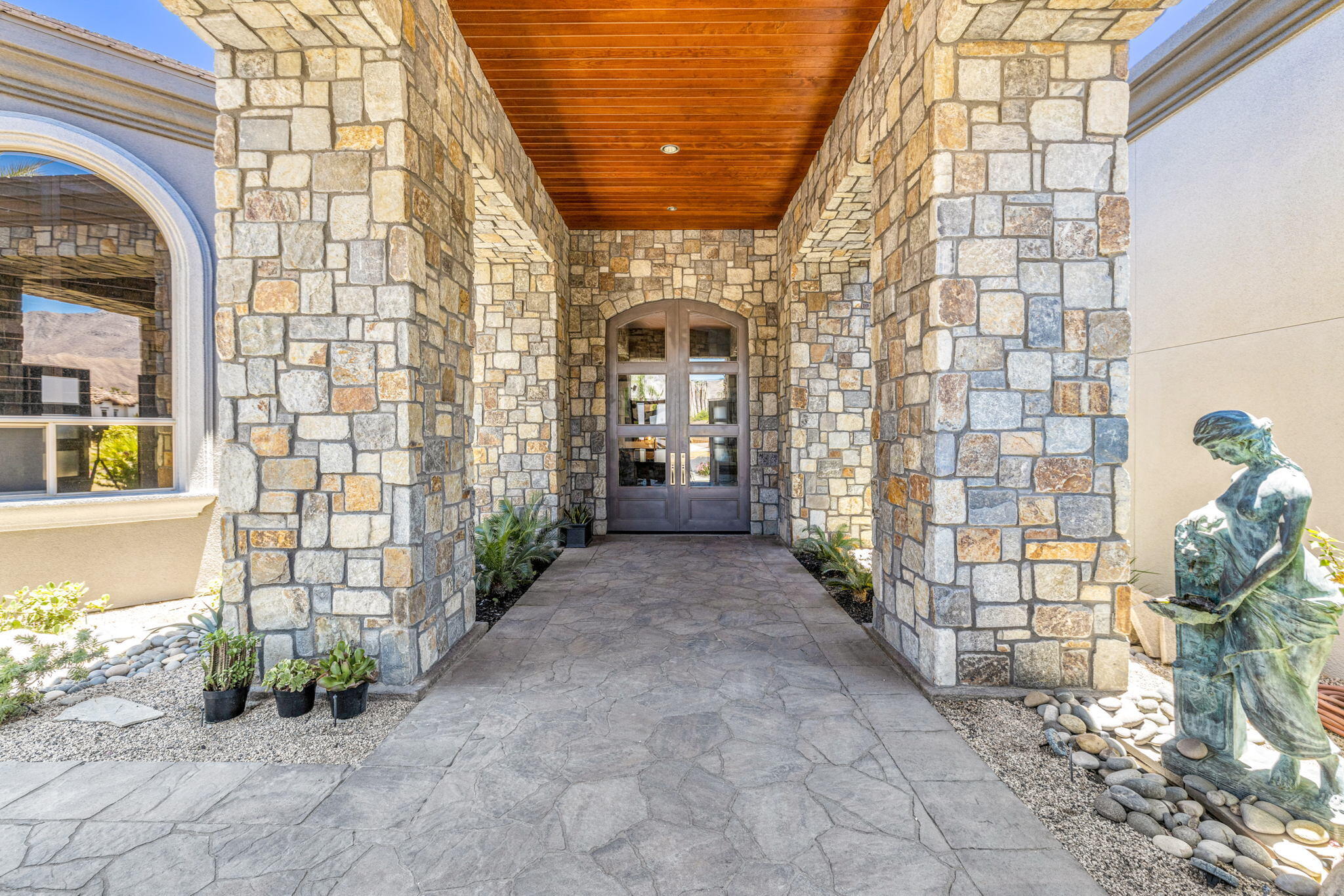 28 Clancy Lane South Rancho Mirage, CA 92270 - Photo 7 of 78 a view of entrance gate of a building