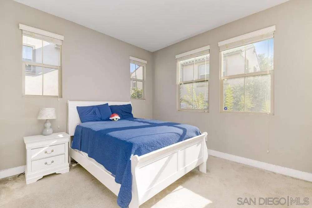 7508 Eagle Drive Santee, CA 92071 - Photo 13 of 25 a bed room with a bed and a window