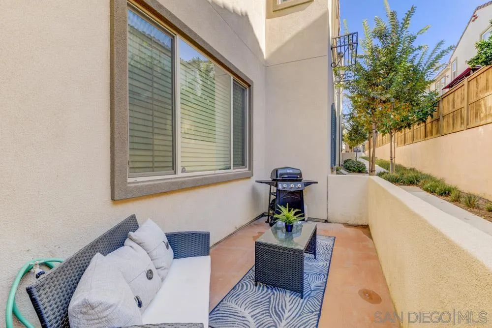 7508 Eagle Drive Santee, CA 92071 - Photo 22 of 25 a living room with furniture and a large window