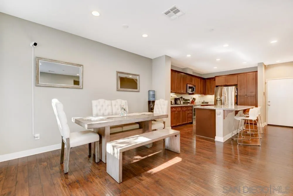 7508 Eagle Drive Santee, CA 92071 - Photo 8 of 25 a living room with furniture kitchen and a table