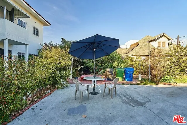 a view of a lawn chair under an umbrella