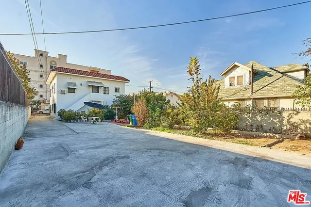 a view of a house with a street